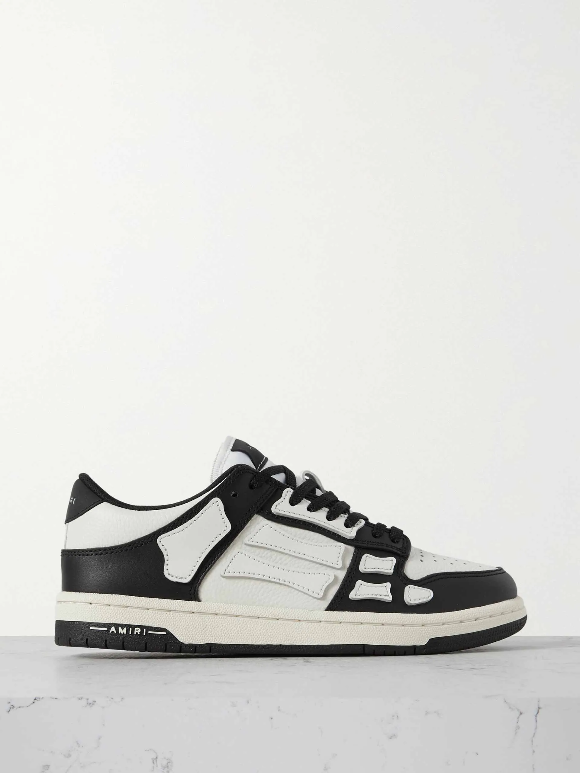 Black & white paneled leather trainers